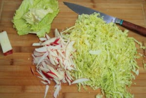 Sliced apples and cabbage