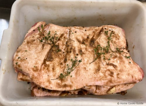 Pork Bellies rubbed with cure paste and herbs